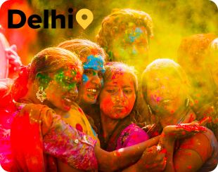 Friends celebrating Holi festival in India 