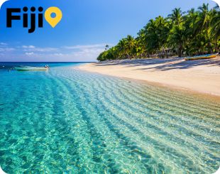 white sand beach, palm trees and crystal clear water in Fiji